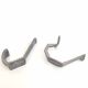 Two mismatched art deco aluminum hooks