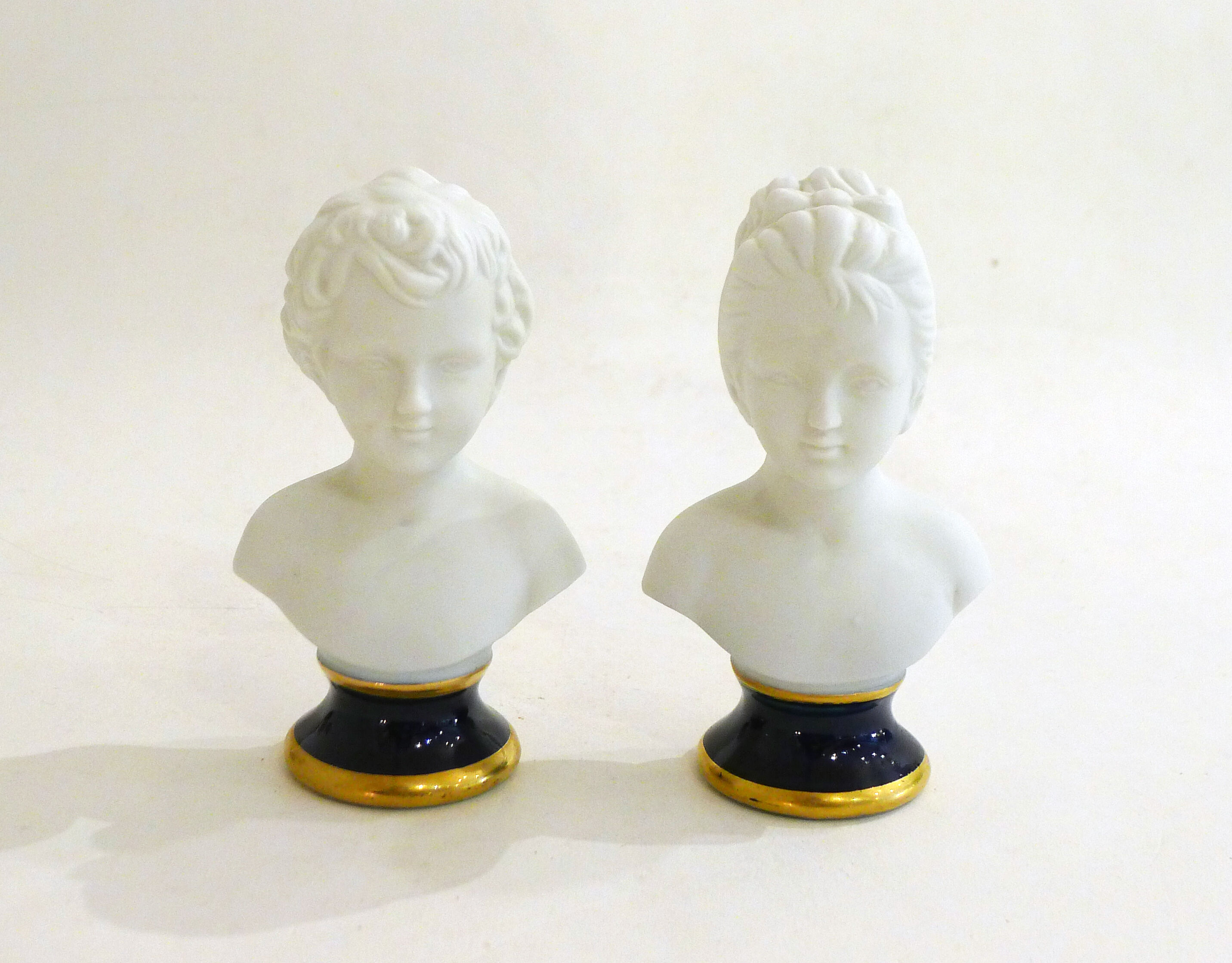 Pair of busts in biscuits