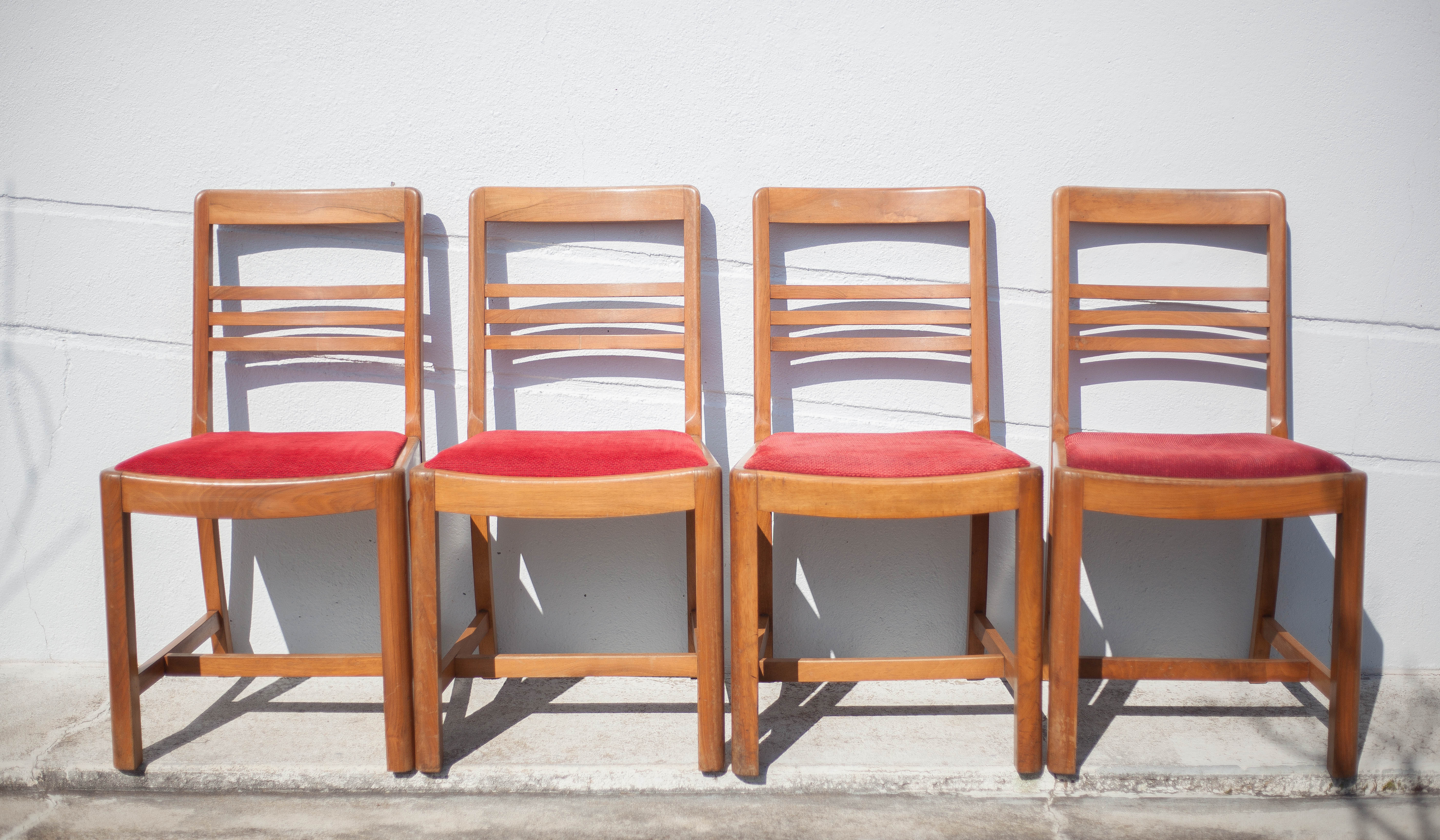 4 wooden chairs and velvet fabric