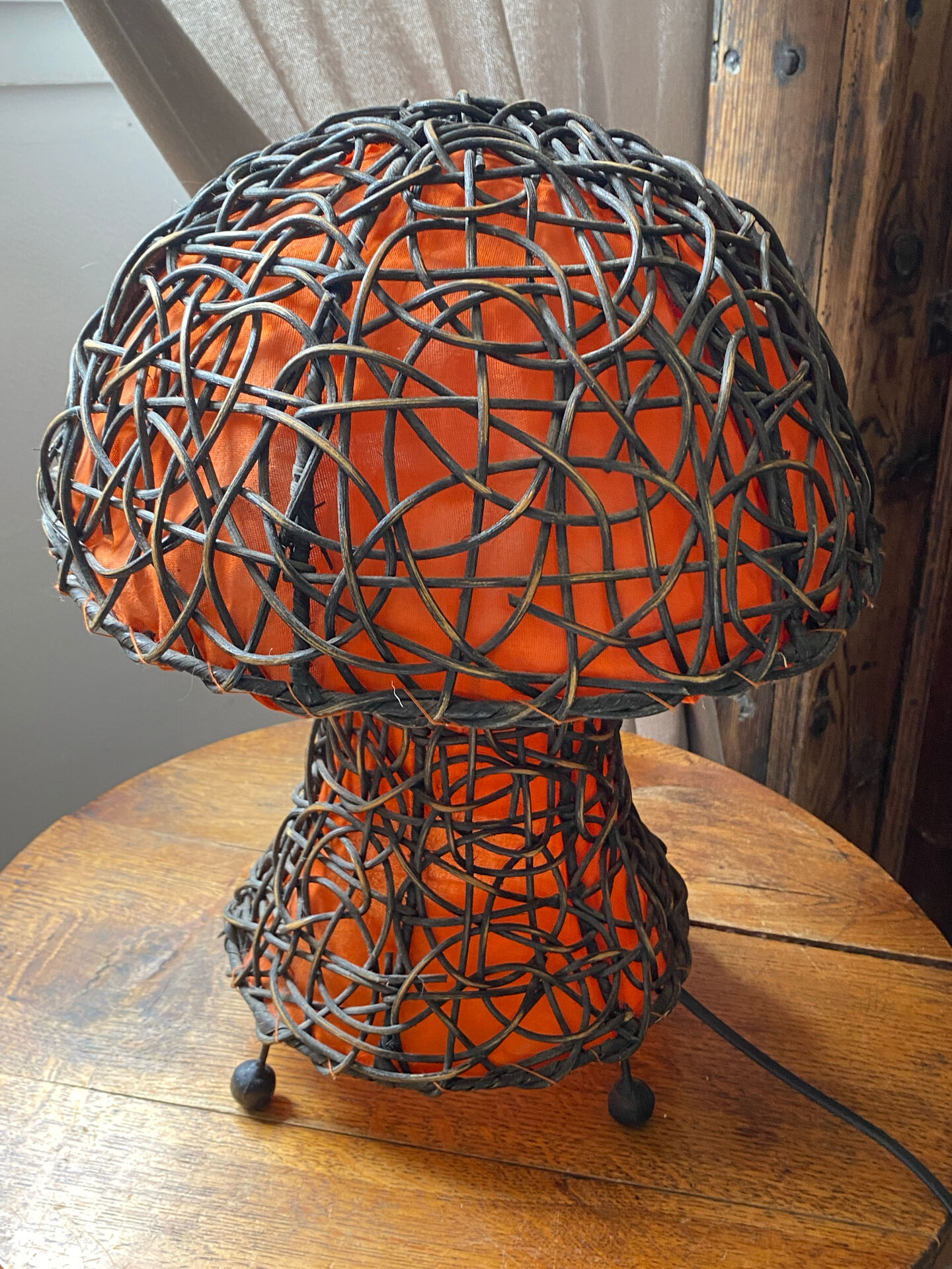 Large mushroom lamp in woven rattan