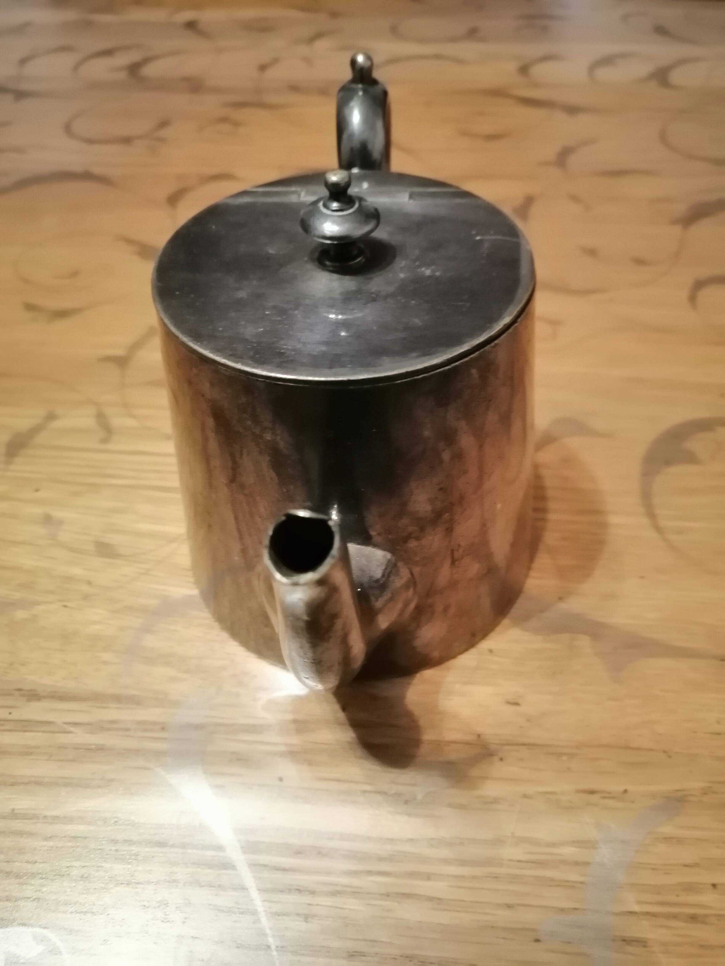 small silver-plated teapot