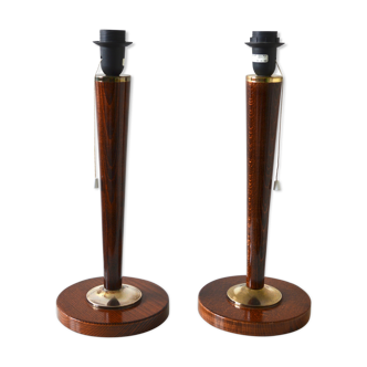 Pair of feet of Mazda-style UNILUX lamps.