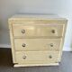 Vintage patinated wood chest of drawers