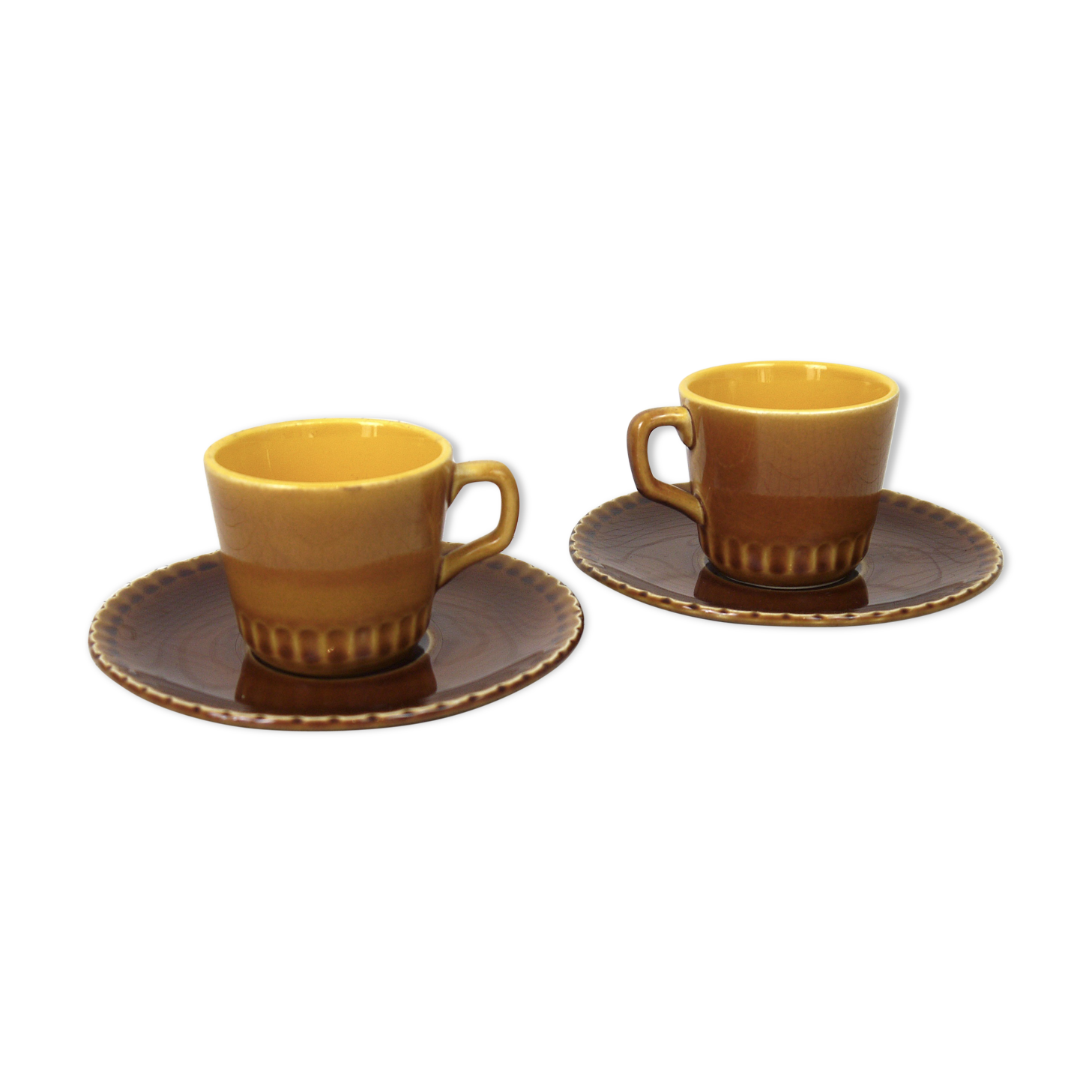 Two Digoin cups and saucers