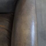 Sheepskin design armchair in a beautiful deep dark color
