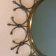 Sun mirror in brass and brushed steel