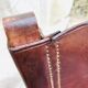 Modernist chair Riaza leather and vintage wood 1960