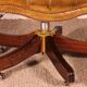 Office chair known as a presidential chair in mahogany and cognac leather.