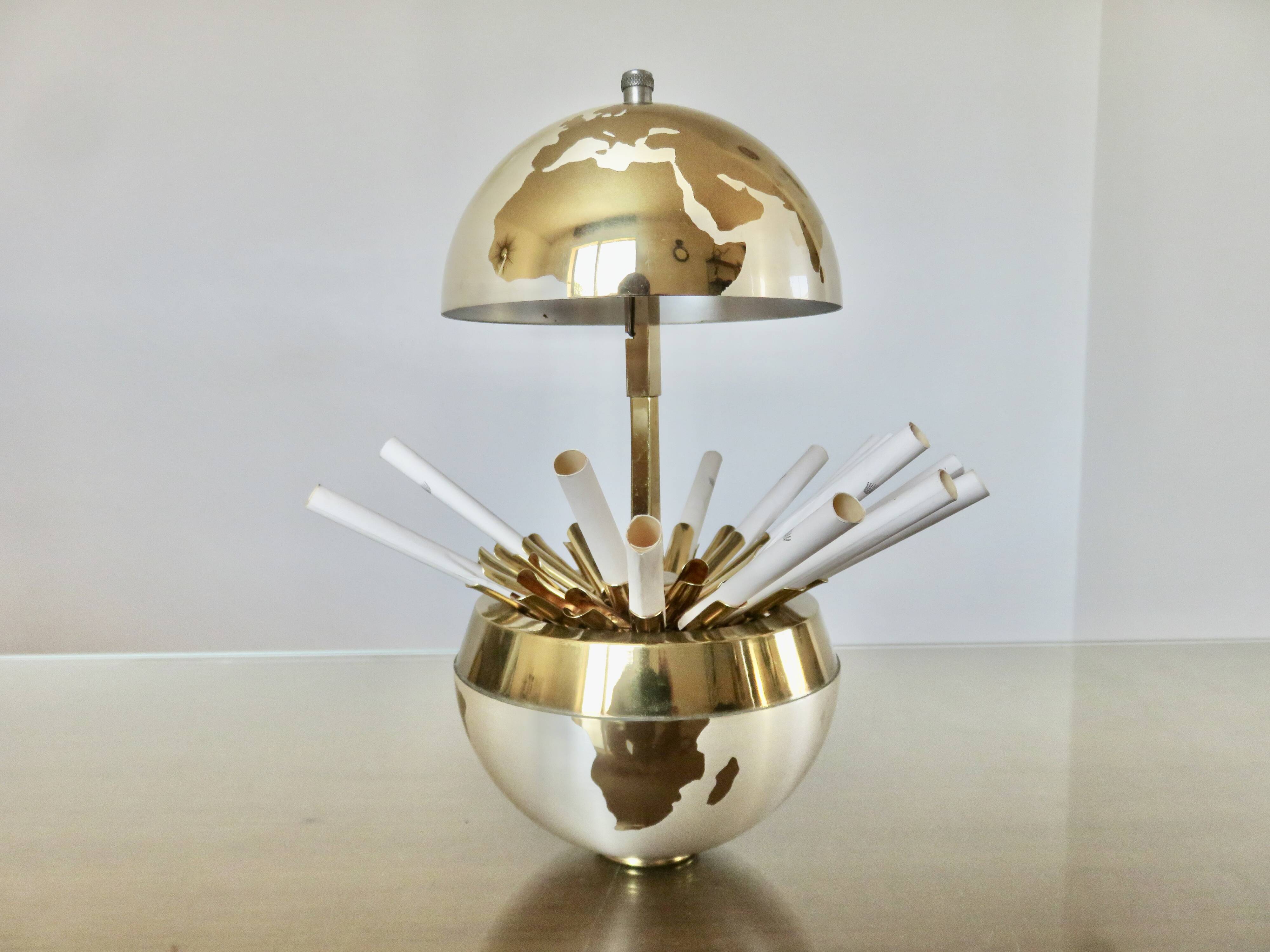 Large terrestrial globe, cigarette dispenser, brass, 1960 - 1970