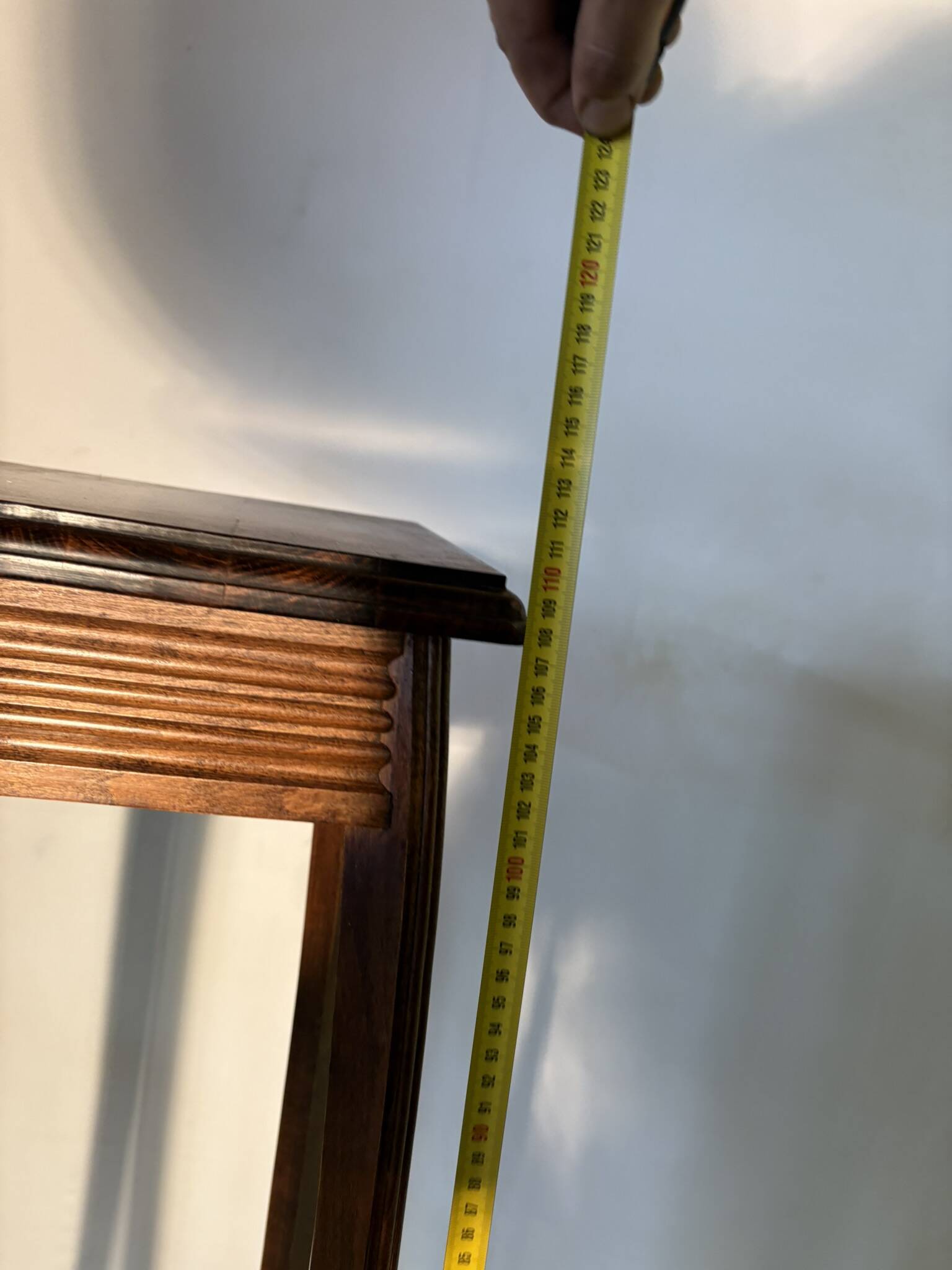 Vintage dark wood side table with curved base