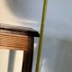 Vintage dark wood side table with curved base