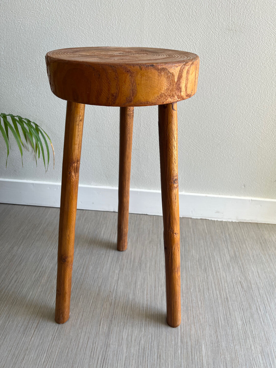 Tripod stool in a brutalist style