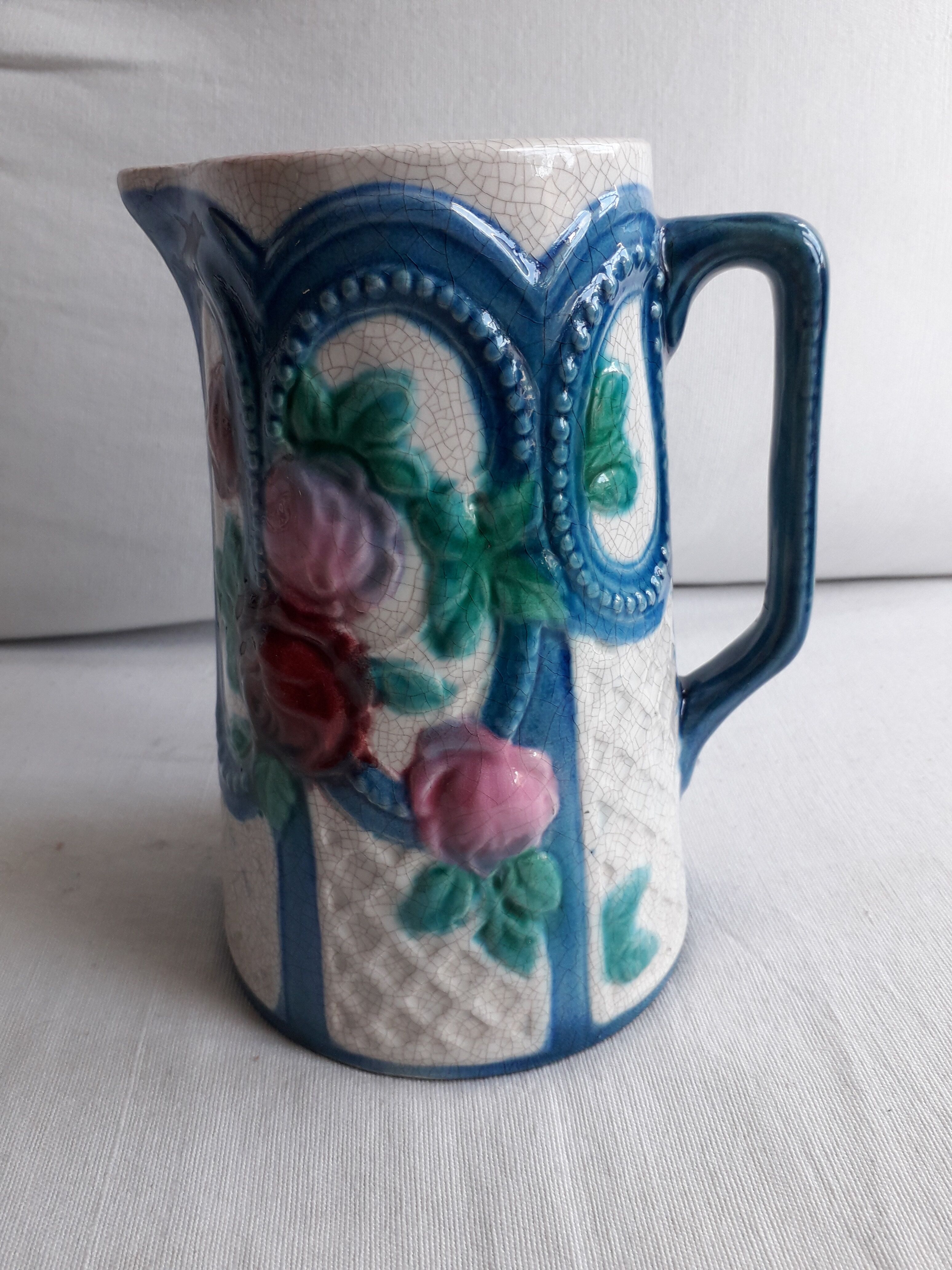 Vintage pitcher in slurry signed
