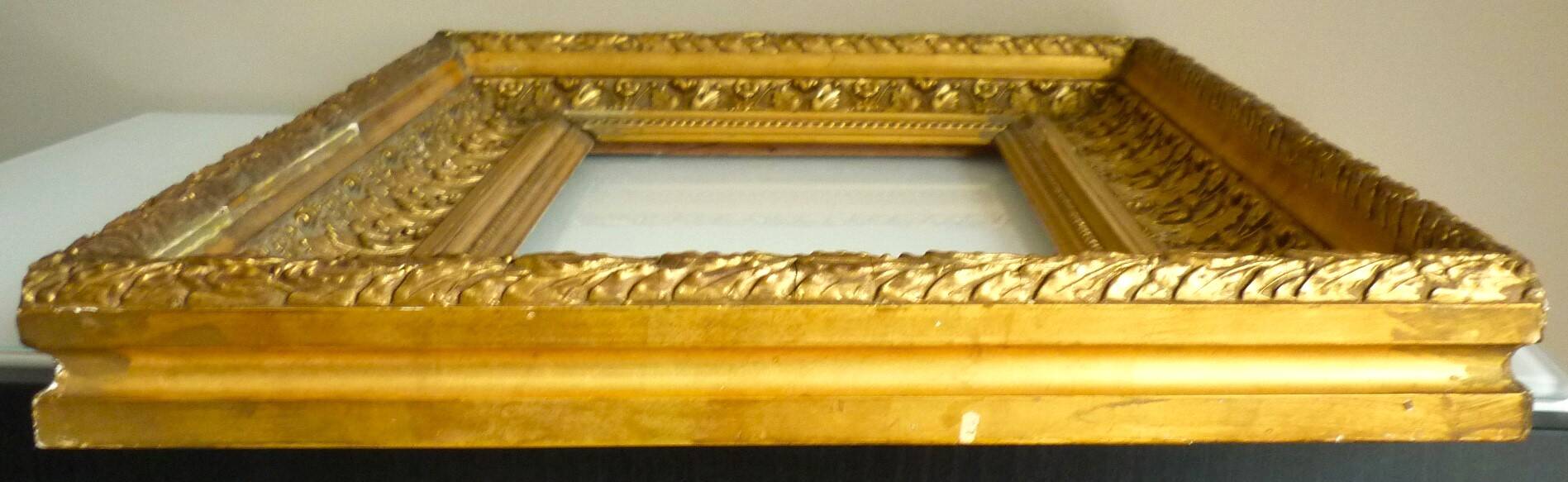 Antique gilded frame in wood and stucco, carved, original gilding