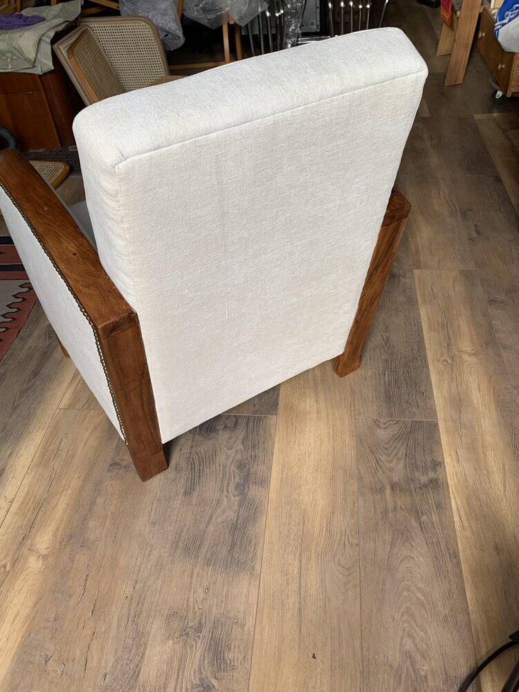 Hungarian Art Deco armchair 1930s beige fabric, carved wooden structure, elegant and comfortable.