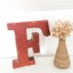Red metal "F" sign letter