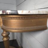 Louis XVI style console in gilded wood with a marble top.