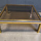 Table basse vintage en chrome et laiton dans le style de Romeo Rega, années 1970.
