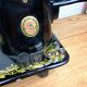 Singer - old sewing machine - black lacquer with golden patterns - very decorative
