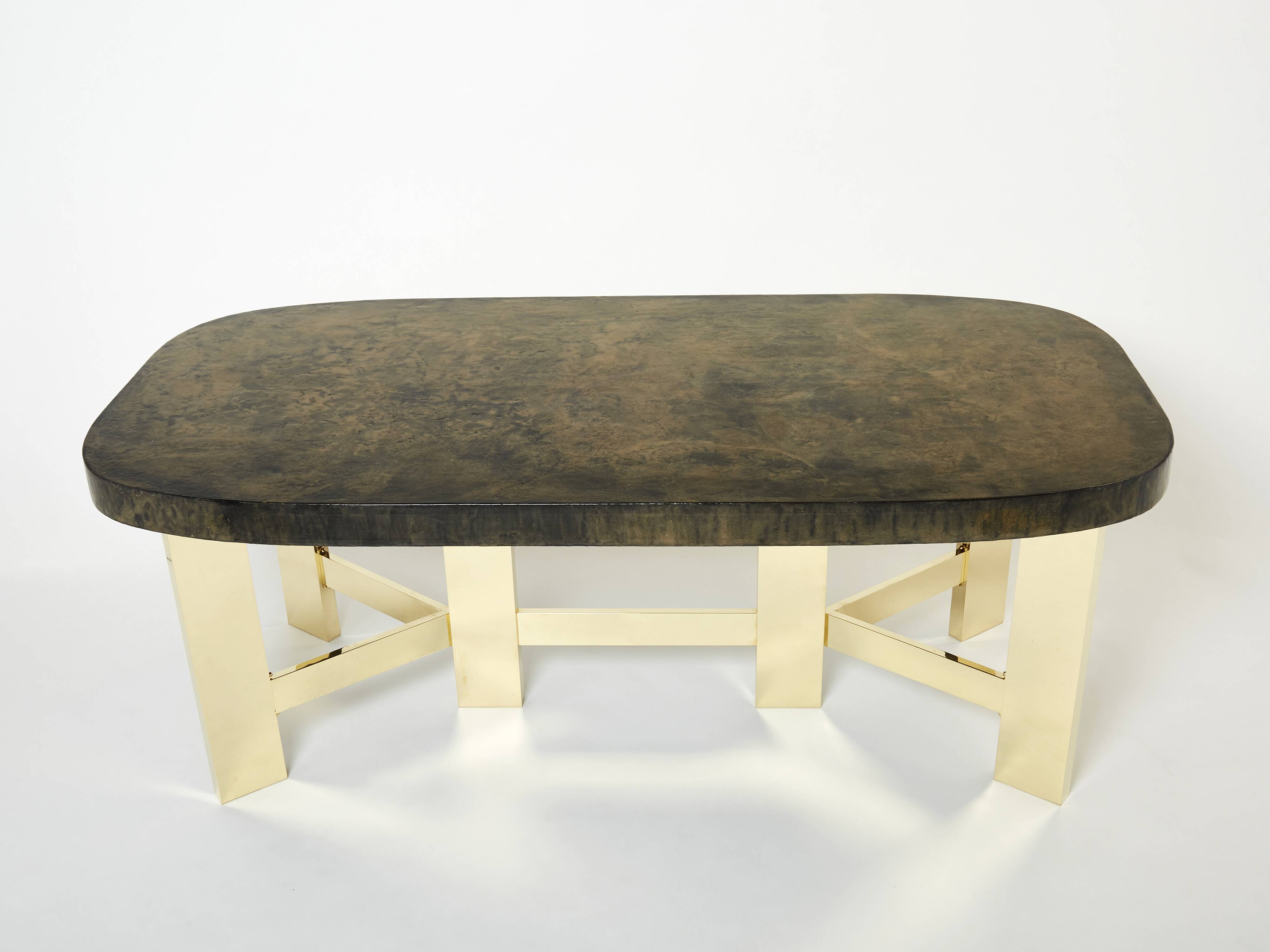 Brutalist Belgian dining table in resin and brass from around 1970.