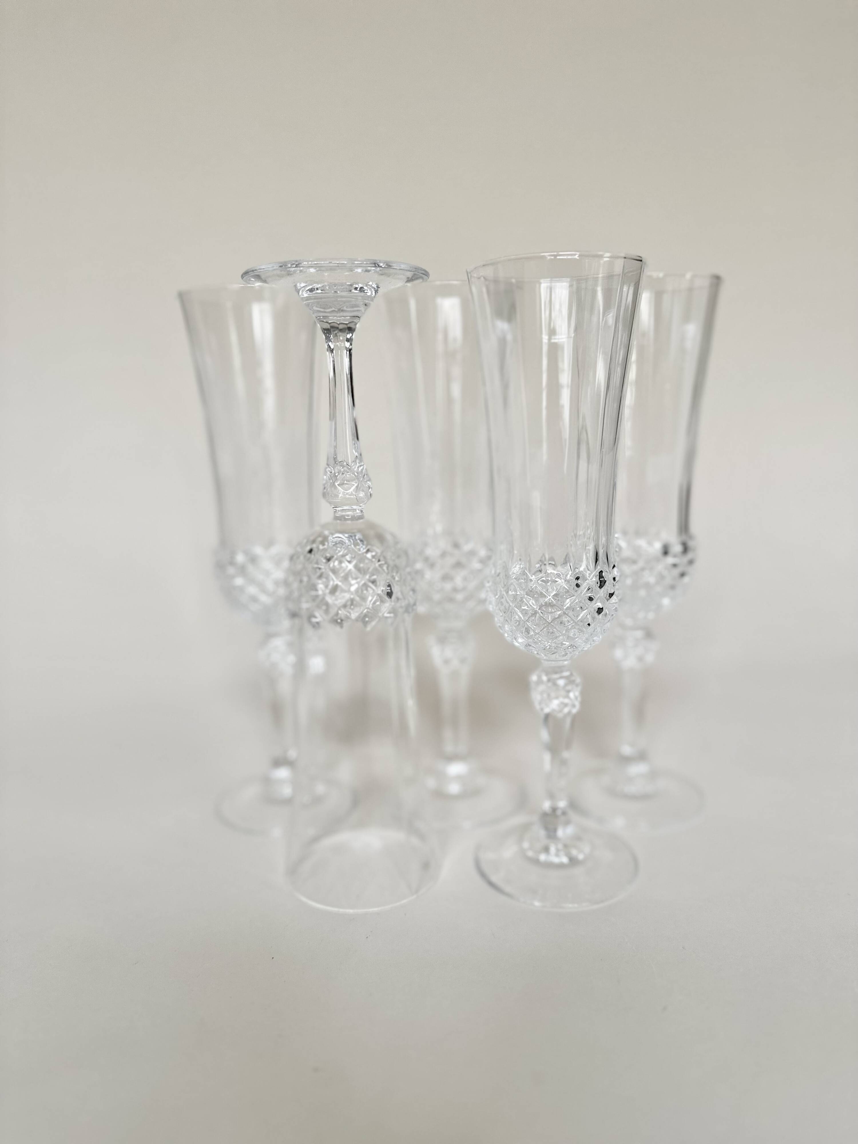 Set of 5 Cristal d'Arques champagne flutes