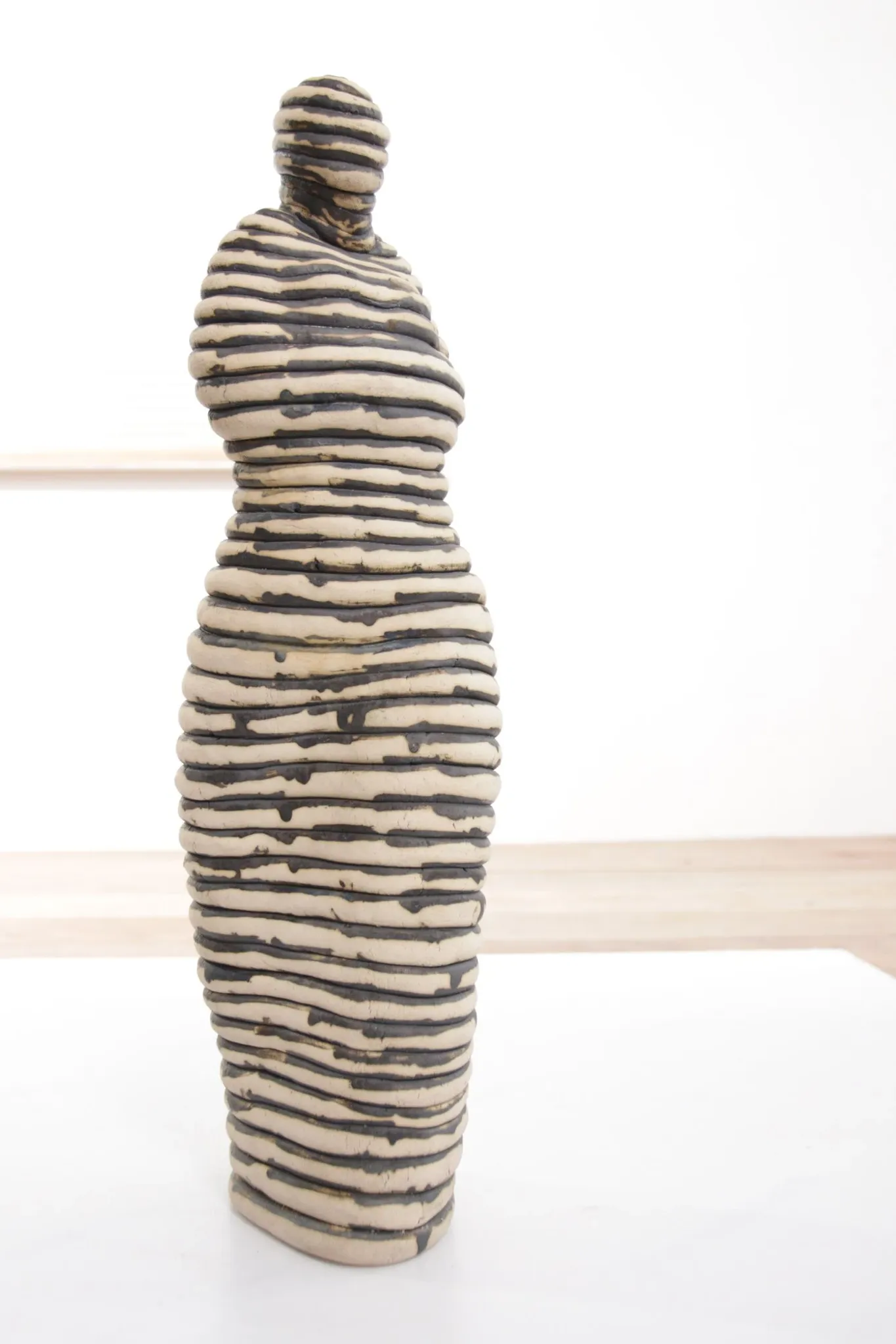 Andrea Dogterom ceramic sculpture women in stripes