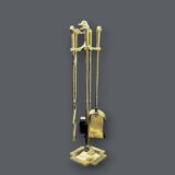 Antique fireplace tool in gilded zamak with duck head designs.