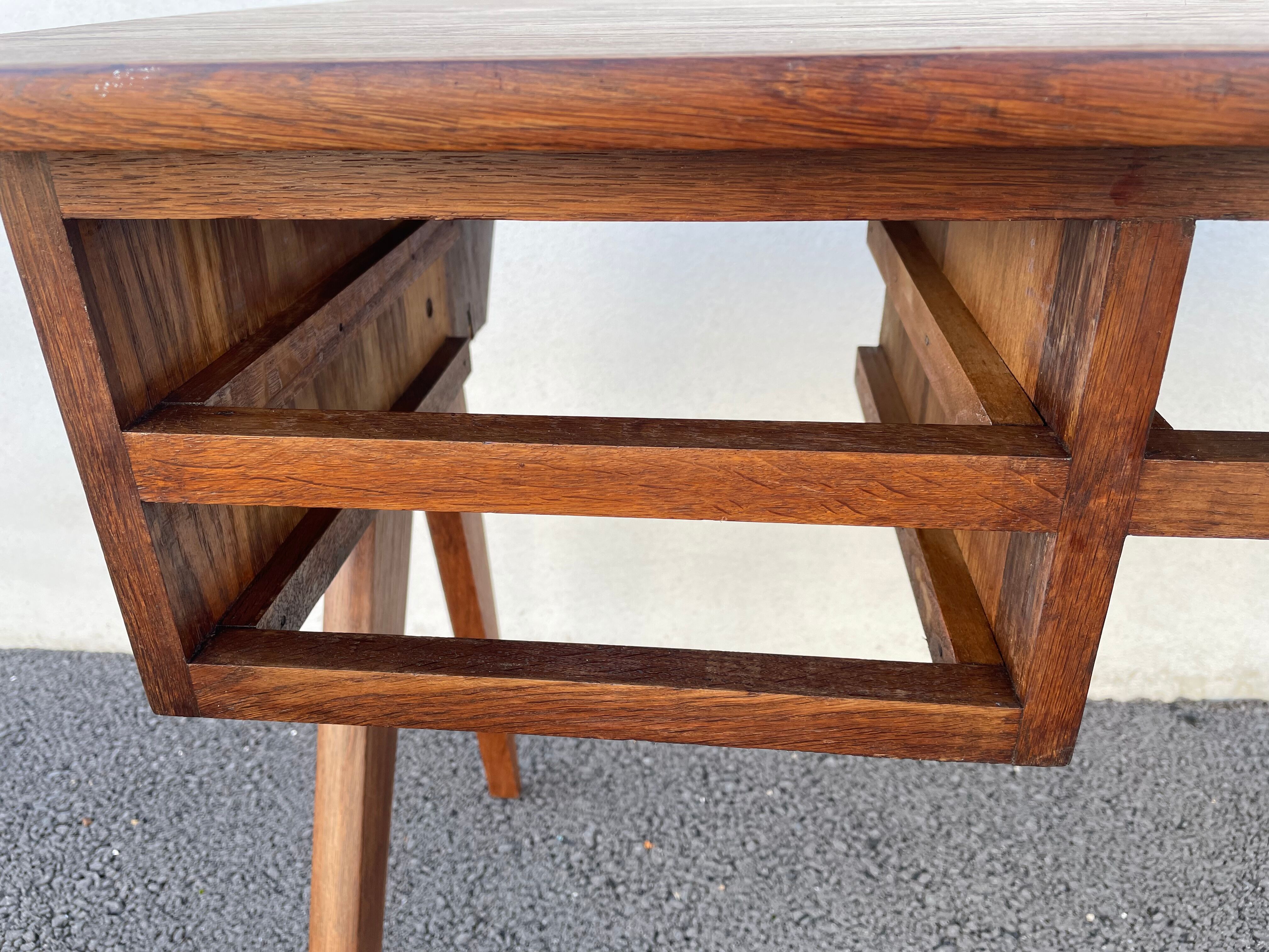 Modernist wooden desk with compass feet 1950