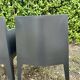 2 black Toy chairs designed by Starck