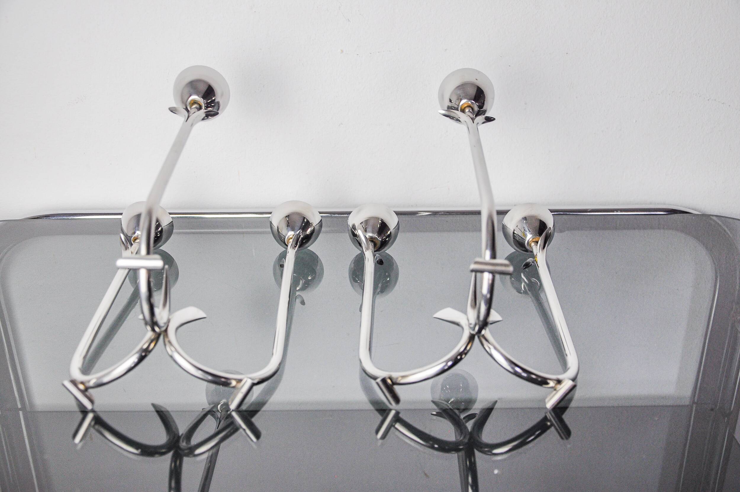 Pair of art deco stainless steel 3-flame candlesticks, Spain, 1970