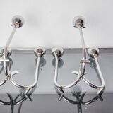 Pair of art deco stainless steel 3-flame candlesticks, Spain, 1970