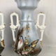 Pair of paris porcelain vases with bird decorations