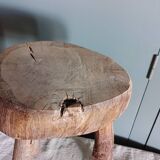 Old small country stool in raw wood - tripod base
