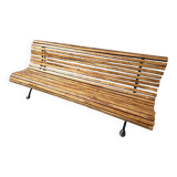 Wooden garden bench with cast iron base