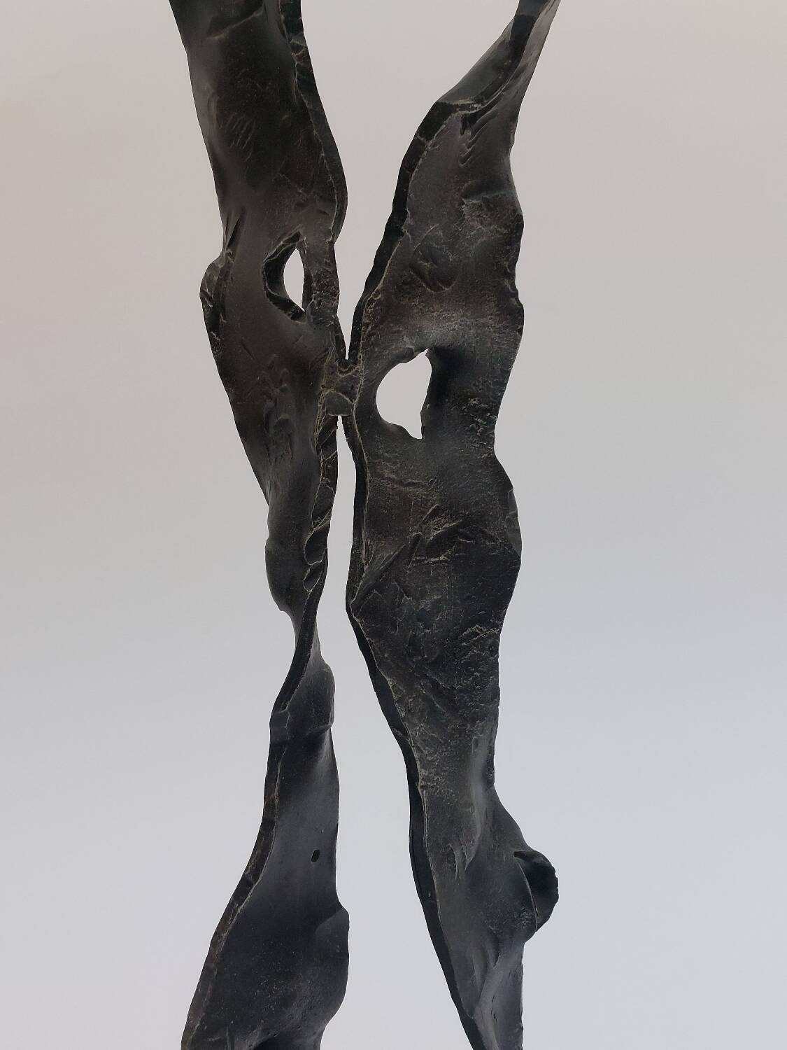 Sculptural brutalist floor candle holder made of hand-forged iron from the 1950s.