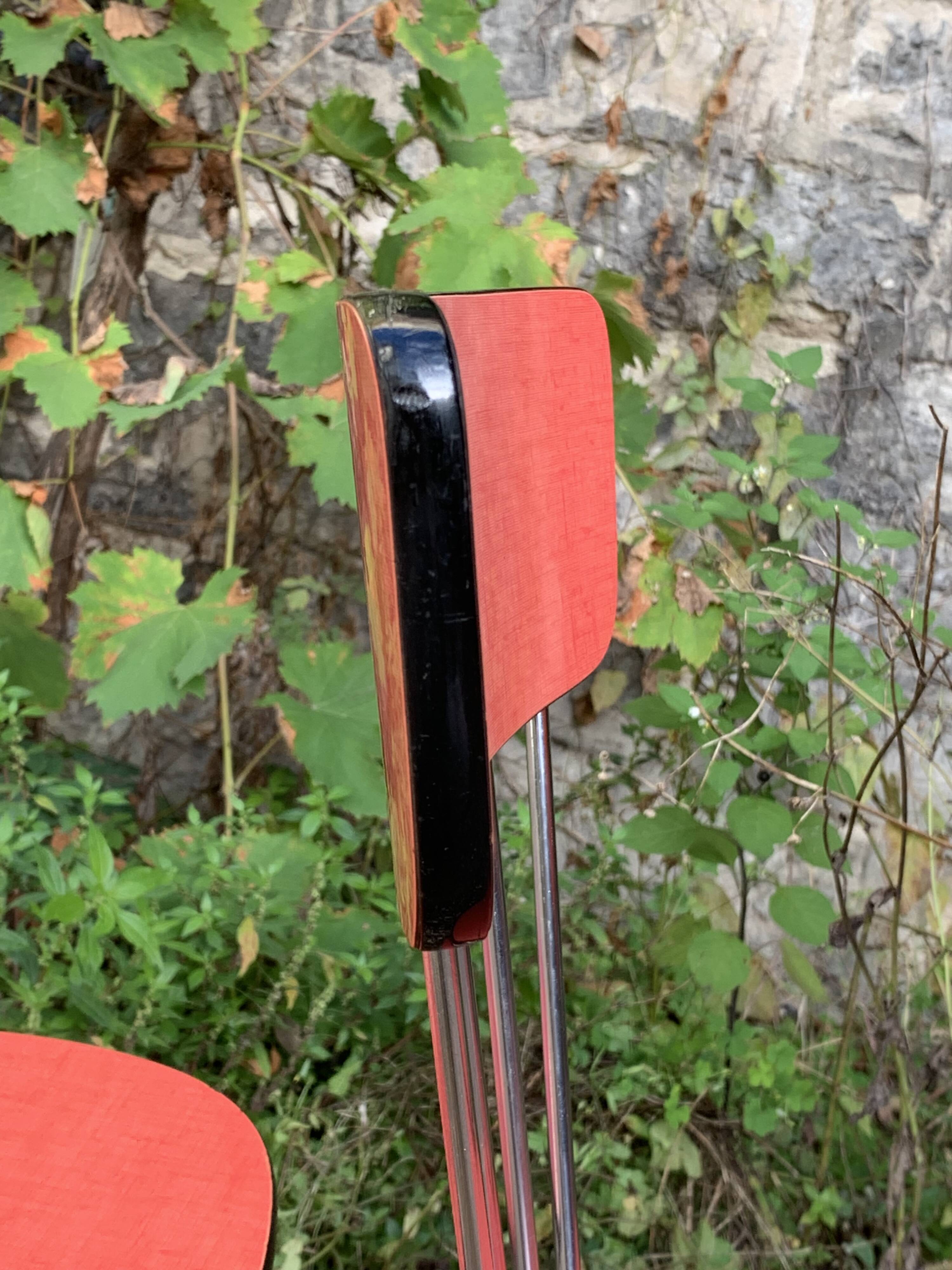 4 red Formica chairs with Eiffel legs, 1950s