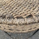 Round side table in woven straw and black steel