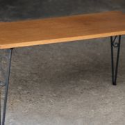 Nice vintage coffee table (1970s). Made of plywood and cast iron.