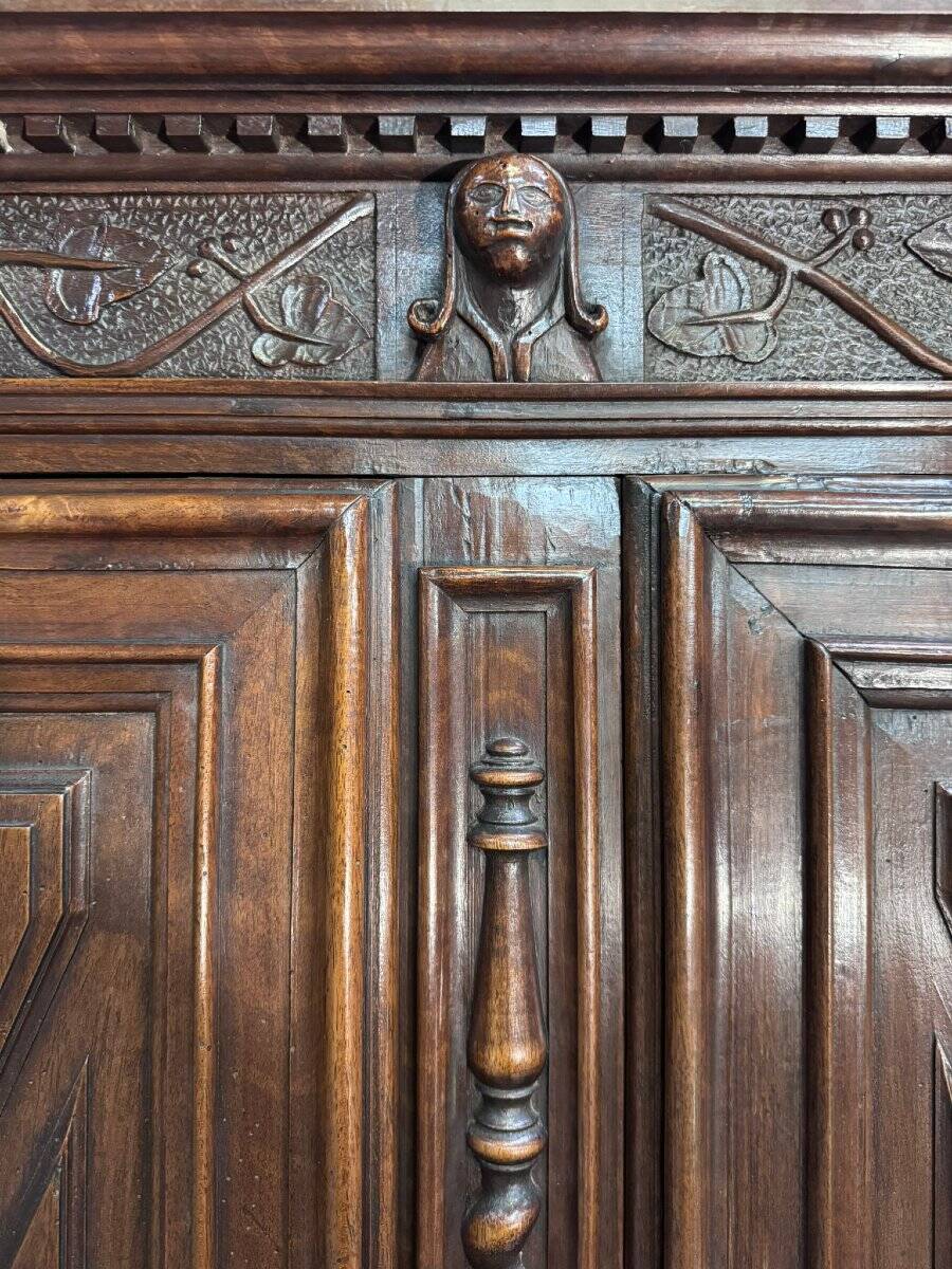 Four-panel buffet from the Louis XIII period in solid walnut.
