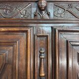 Four-panel buffet from the Louis XIII period in solid walnut.