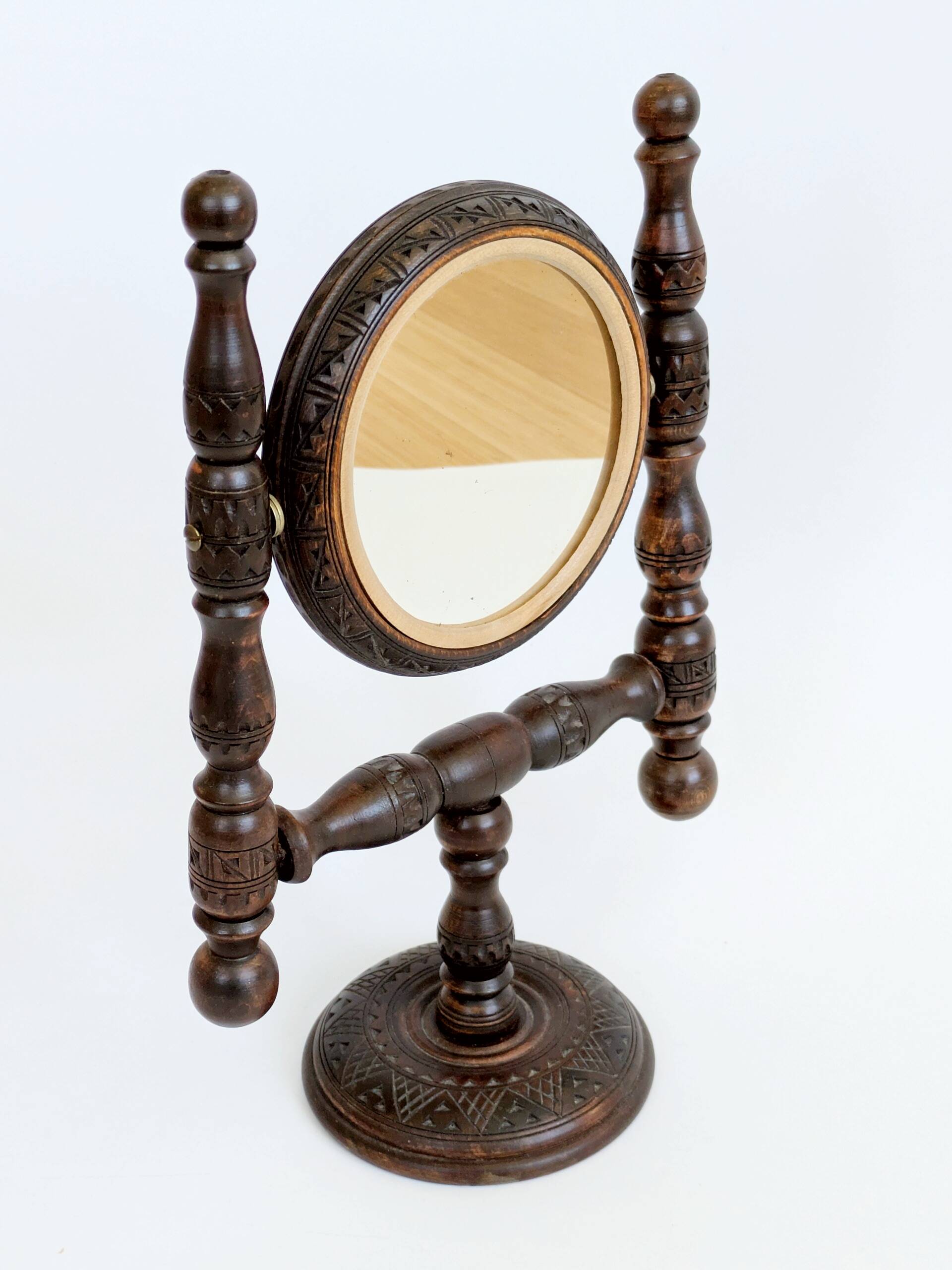 Vintage pivoting mirror to place, carved wood, rustic folk art decor.