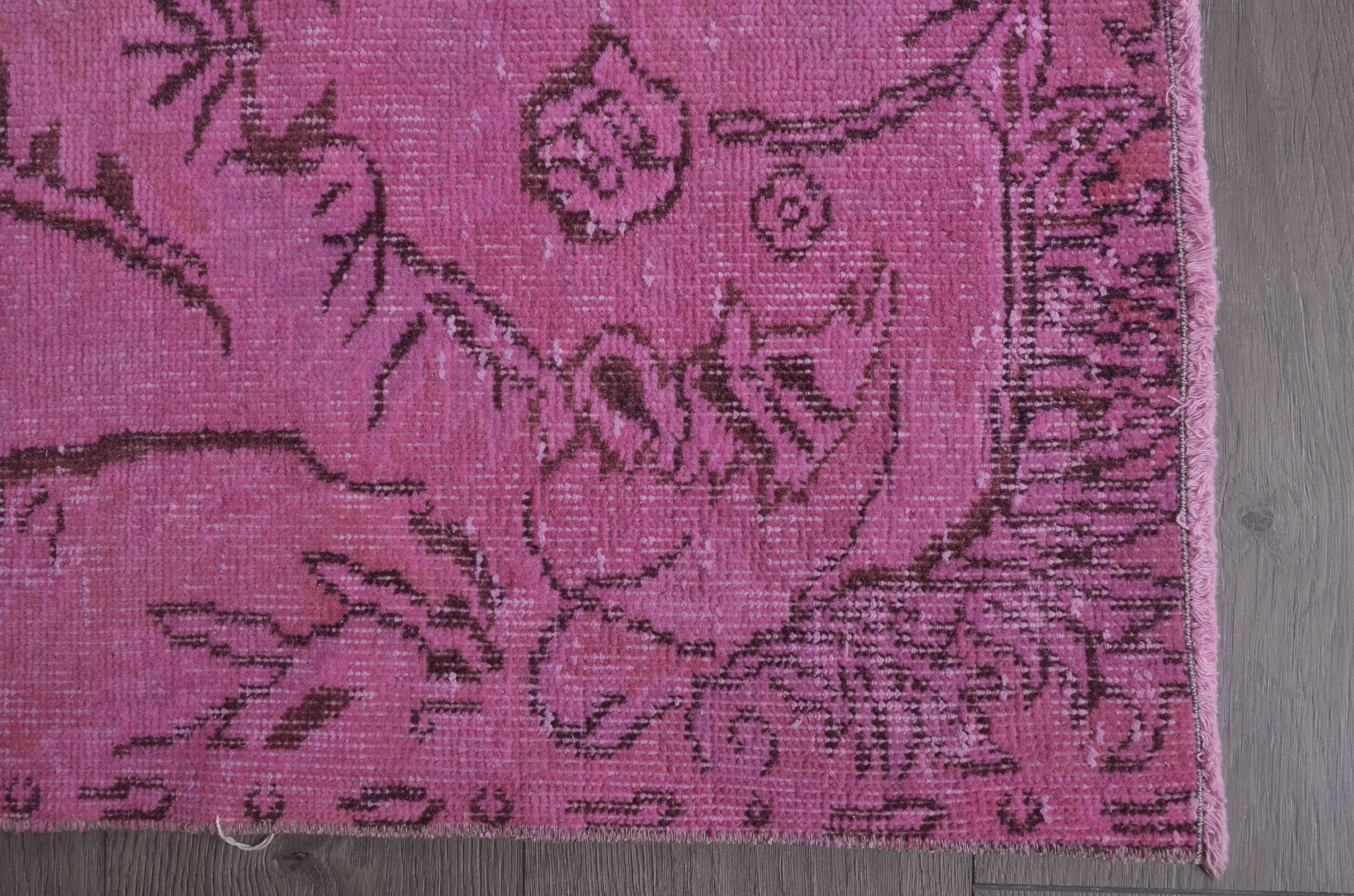 Tapis Oushak rose vintage