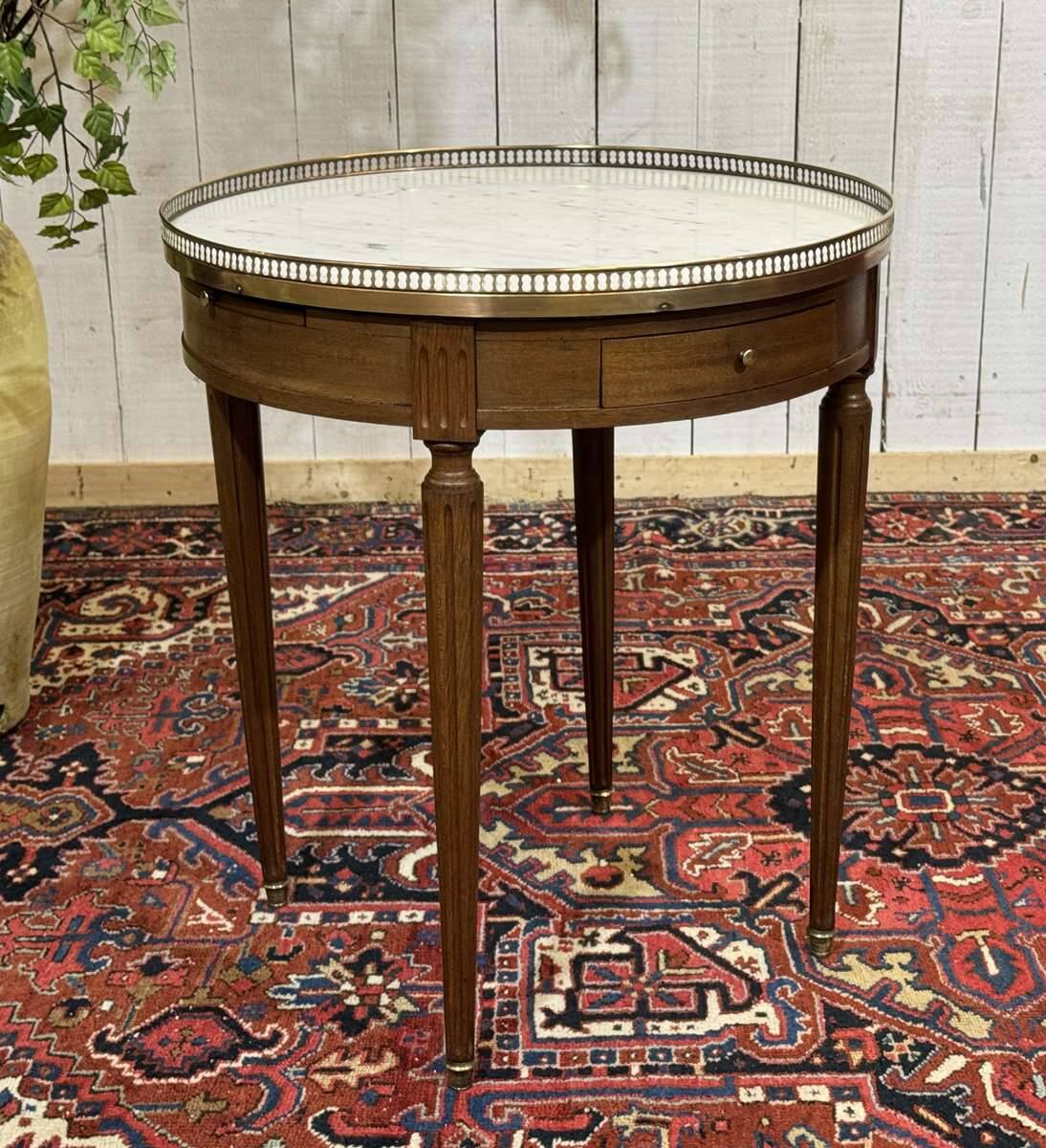 Louis XVI style bouillotte table from the 1960s in mahogany with a marble top.