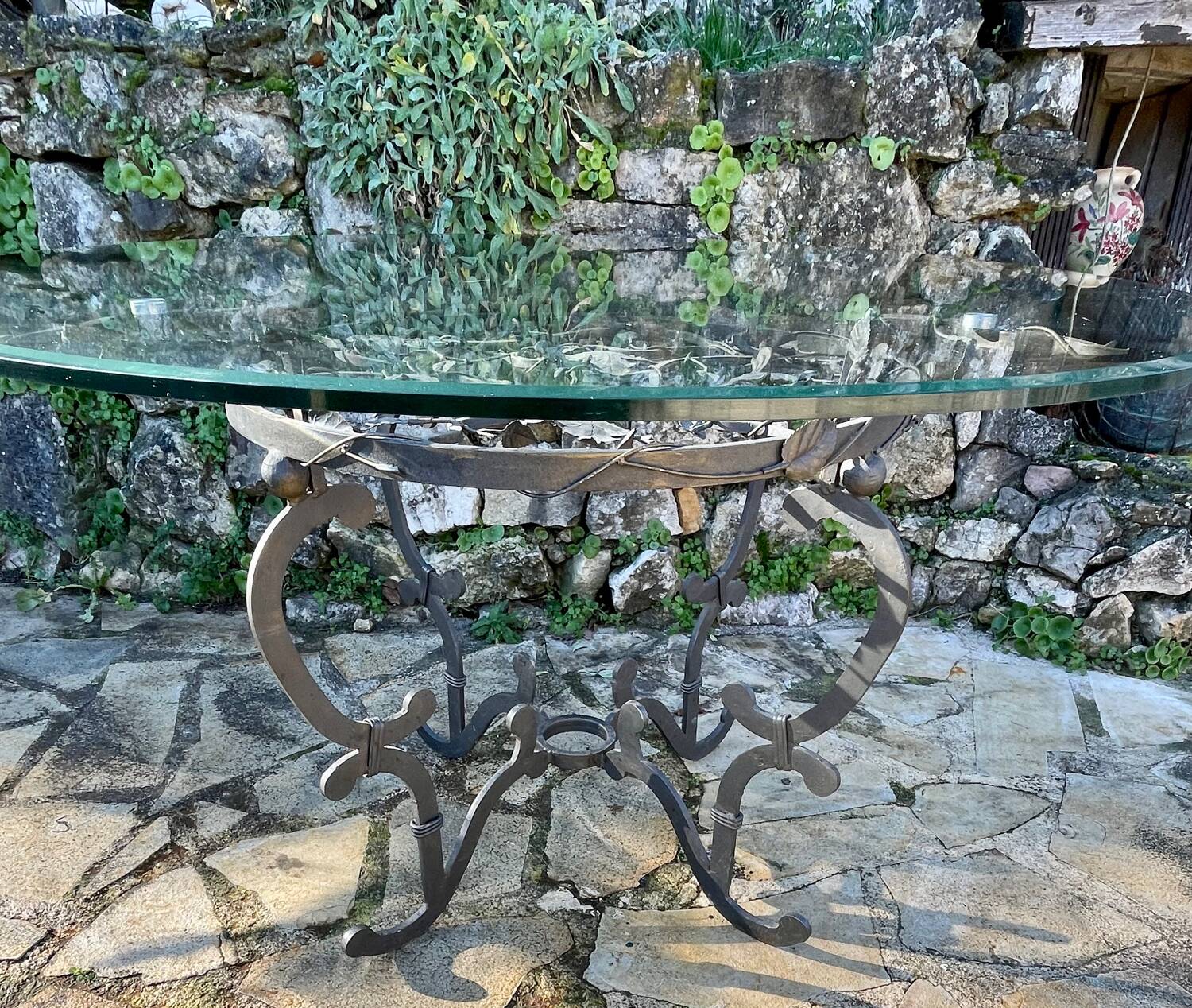 Round wrought iron table for 6 people