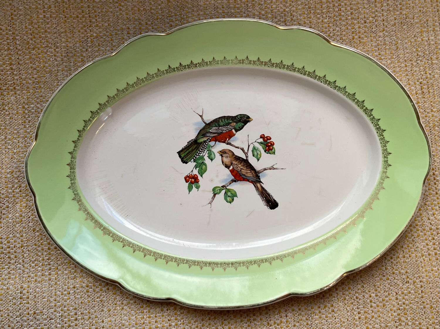 Old oval dish in Badonviller earthenware, decorated with Les Oiseaux.