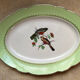 Old oval dish in Badonviller earthenware, decorated with Les Oiseaux.