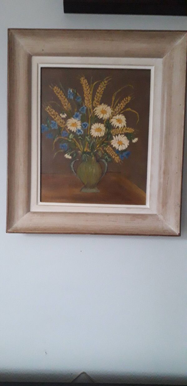 Tableau ancien à l'huile représentant un bouquet de fleurs