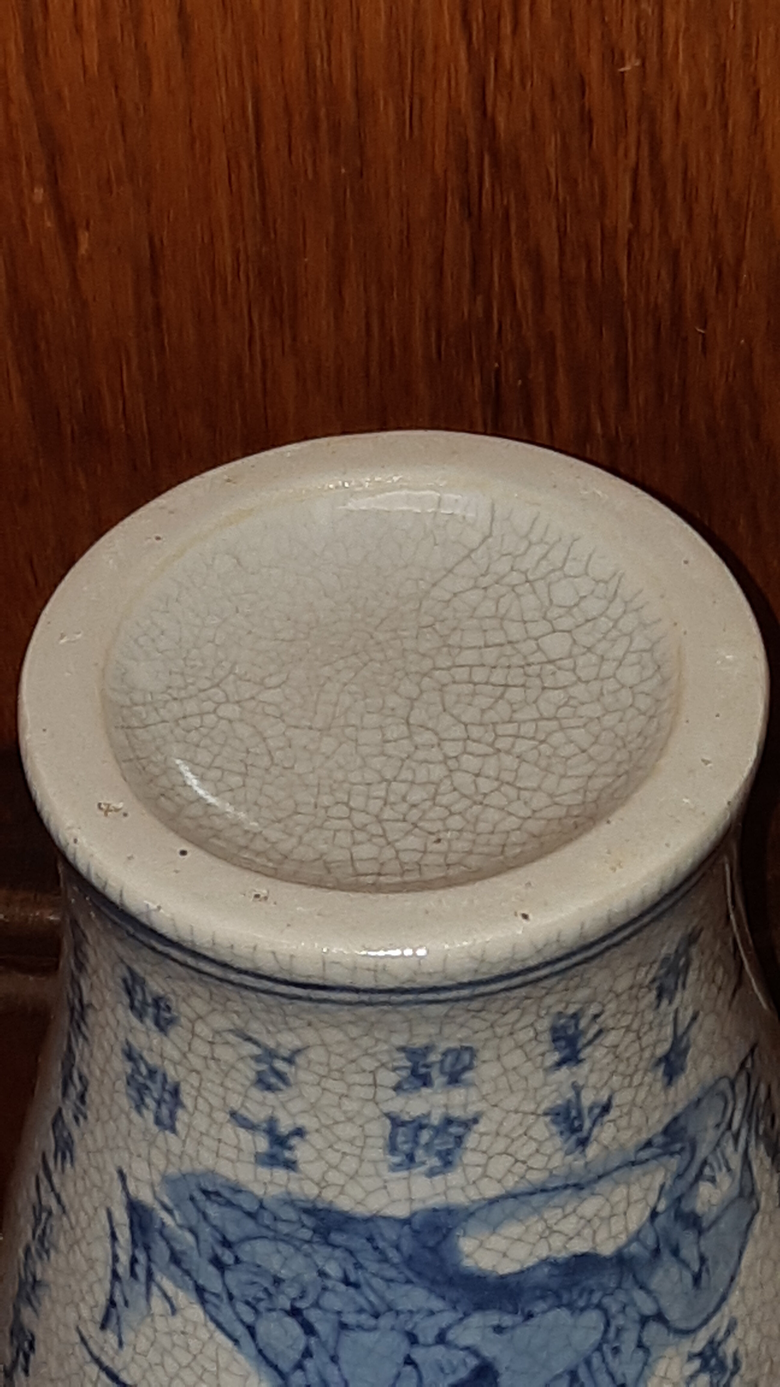 Ancient Chinese vase with blue decoration of sage and inscriptions