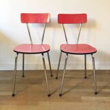 Duo of red formica chairs