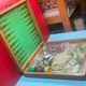 old wooden checkers' box, goose game, dada horses and jacquet with pawns. collectible game